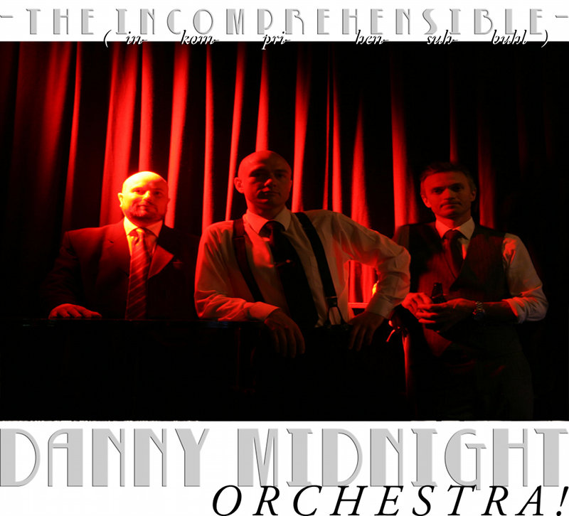 The Incomprehensible Danny Midnight Orchestra is a band of three well-clad men and a steel gray machine.